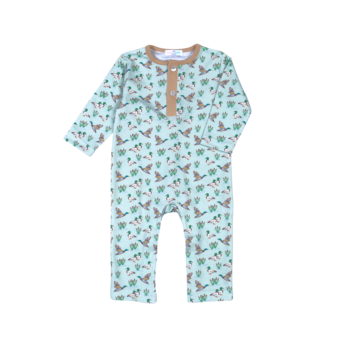 A baby long-sleeve romper in light mint green with an all-over print of corgis and cactus, featuring a tan Henley collar with snap buttons.